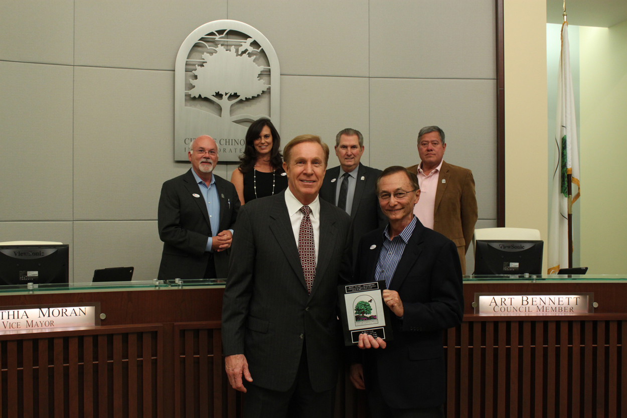 Gary Miller receiving a City Tile
